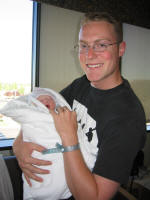 Bob holding Damon